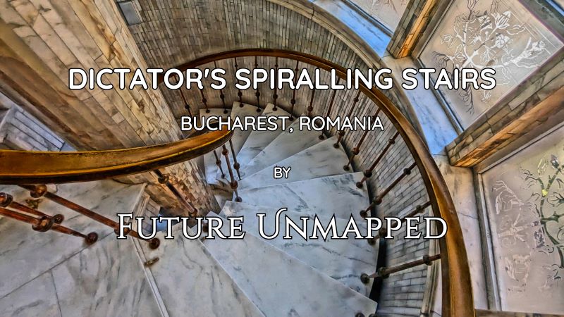 White-marble staircase - with contrasting metallic handrail and slender spindles - spirals around central column, softened by botanical-etched windows.